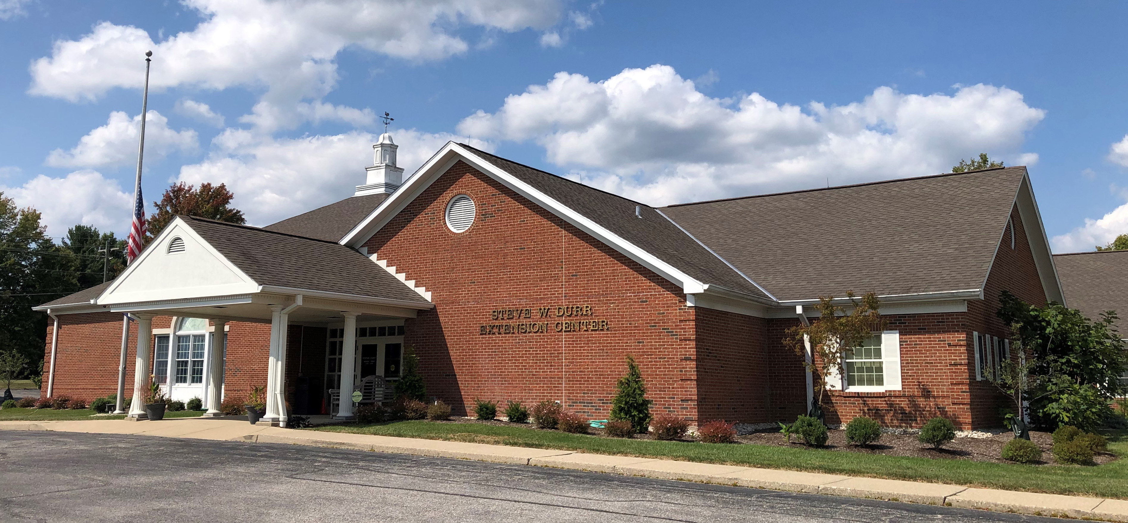 Kenton County Cooperative Extension main office building. A single story, red brick building with white trim.